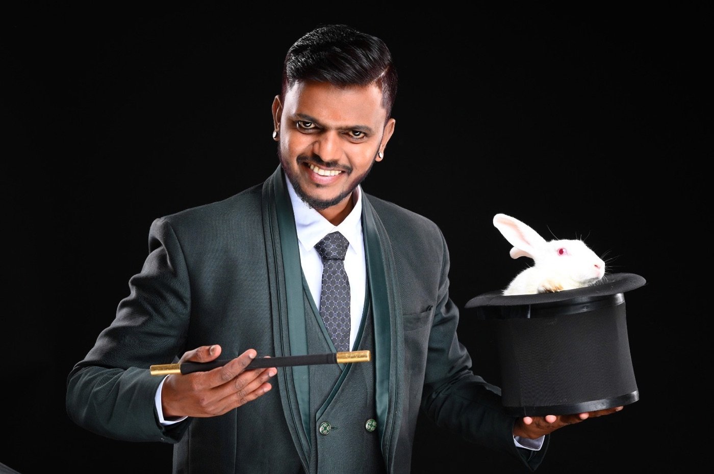Vicky Krish performing a classic hat production
